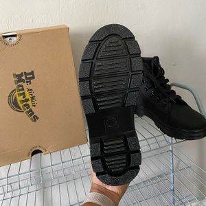 Dr. Marten’s never worn combat boot. Women size 9